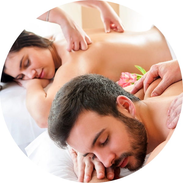 Couple receiving relaxing massage therapy together.