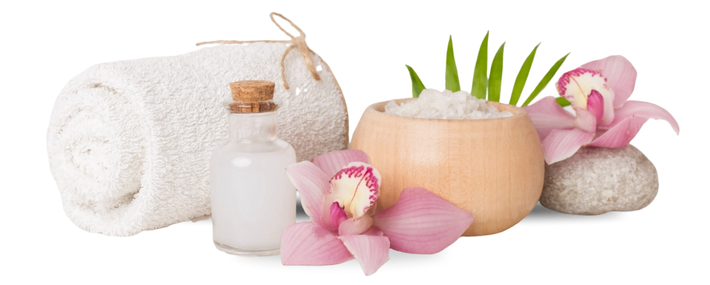 Spa essentials with flowers and towel.