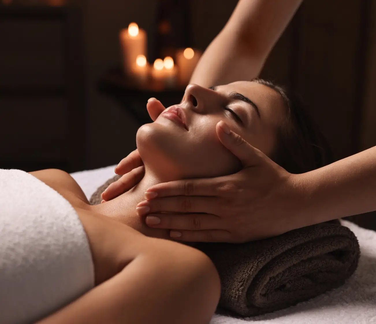 Woman receiving a relaxing neck massage.